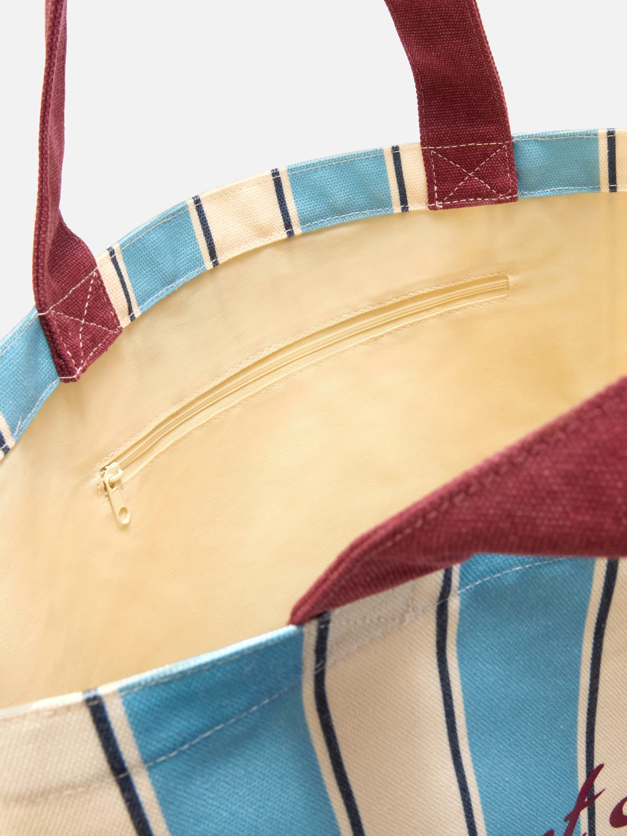 Essential canvas tote bag with light blue and white stripes and contrasting logo - Image 5