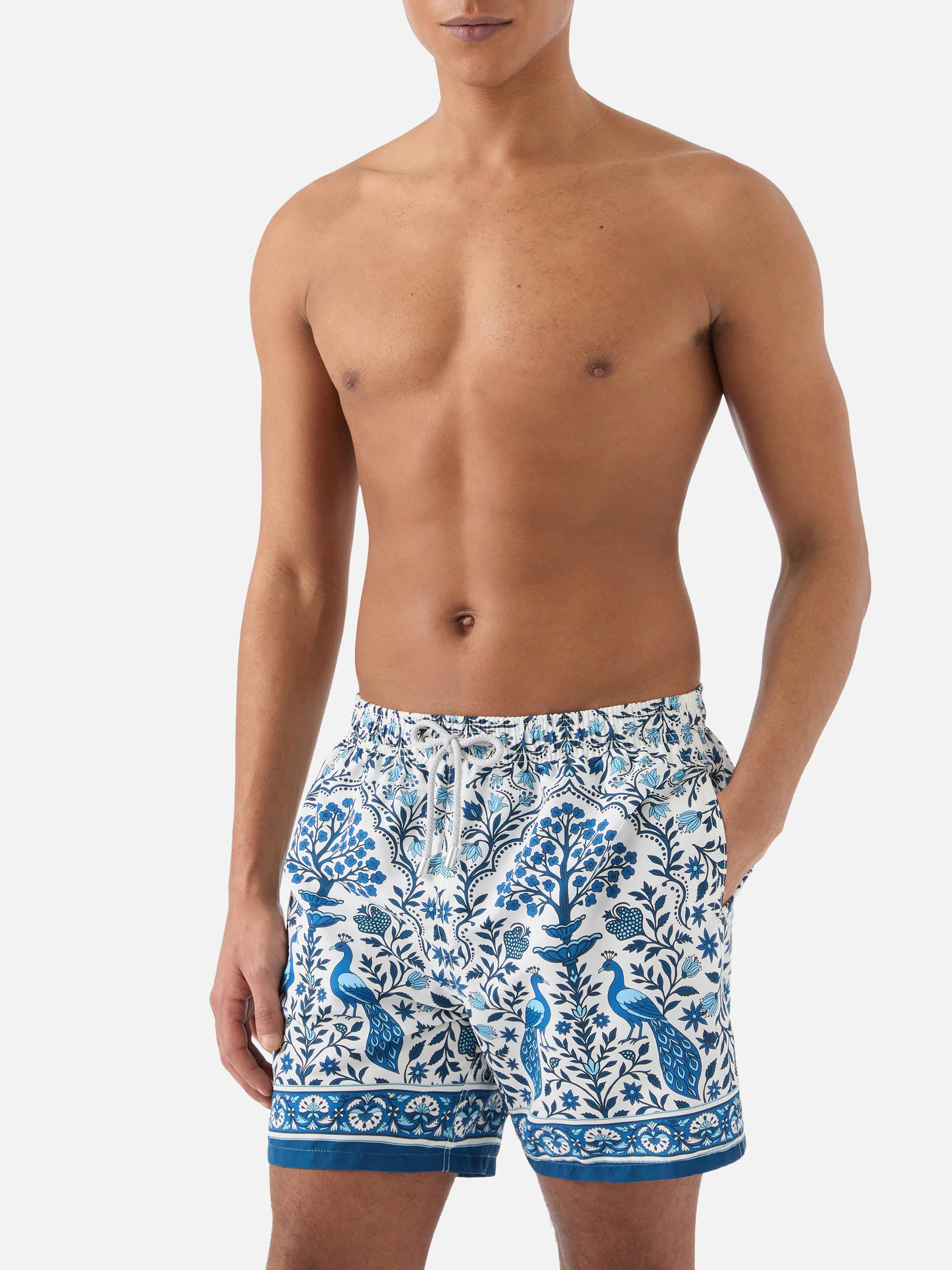 Gustavia white swim shorts with contrasting peacock print - Image 3