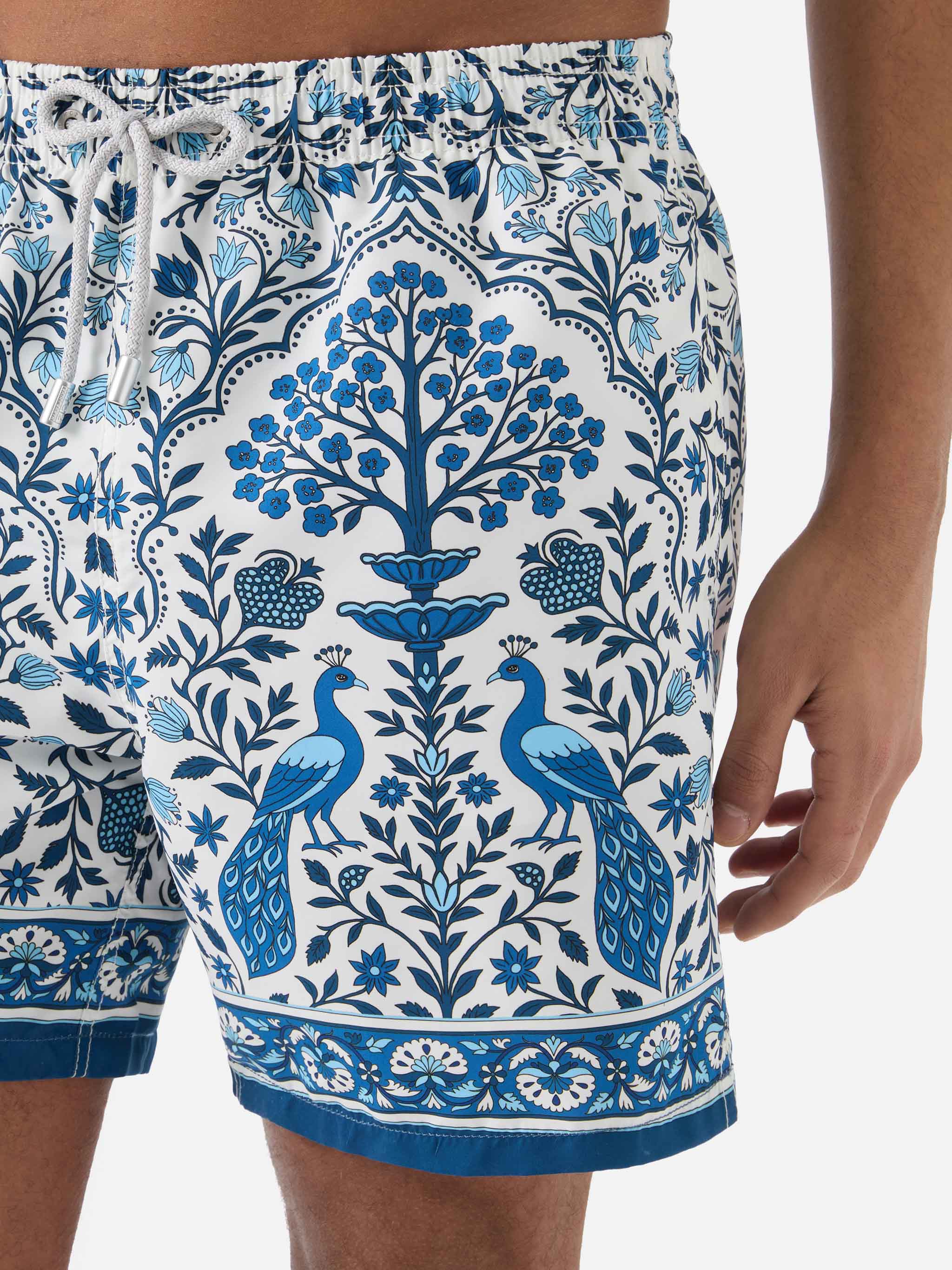 Gustavia white swim shorts with contrasting peacock print - Image 4