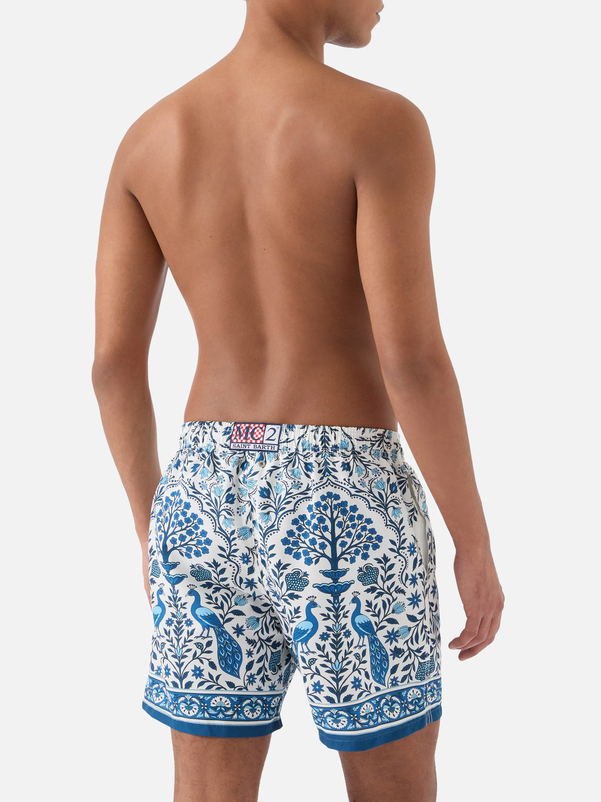 Gustavia white swim shorts with contrasting peacock print - Image 5
